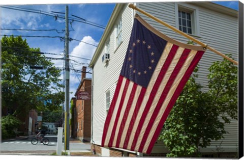 Framed New Hampshire, Portsmouth, Strawberry Banke Historic Area, building with US flag Print