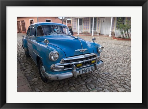 Framed Cuba, Trinidad Blue Taxi Parked On Cobblestones Print