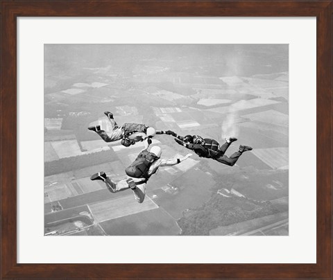 Framed Three Men Holding Hands Sky Diving Print