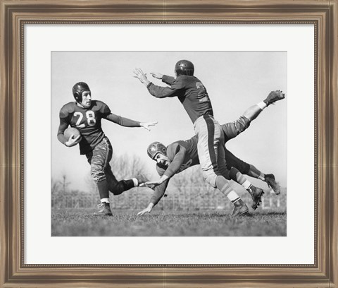 Framed Three Men Playing Football Print