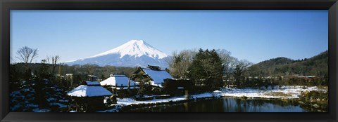 Framed Houses in front of a mountain, Mt Fuji, Honshu, Japan Print