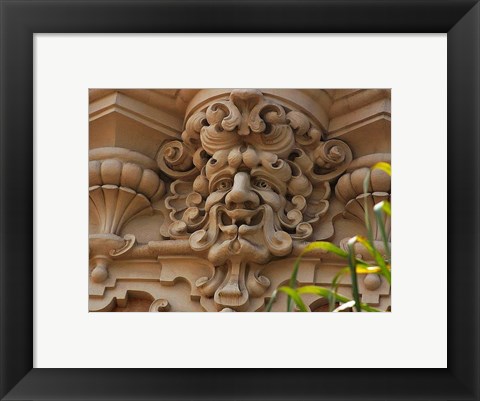 Framed Face In Stone On Buildings Wall Print