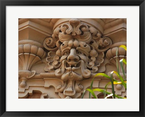 Framed Face In Stone On Buildings Wall Print