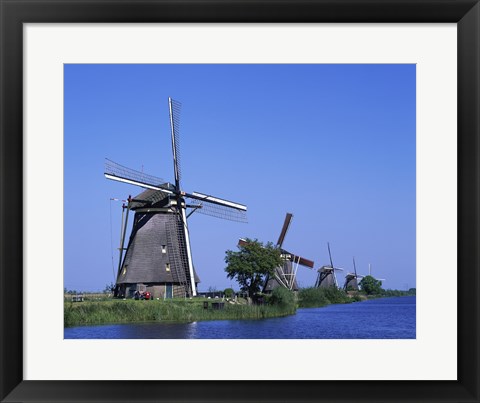 Framed Windmills along a river, Kinderdike, Amsterdam, Netherlands Print