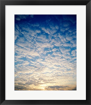 Framed Low angle view of sunrise seen through clouds Print