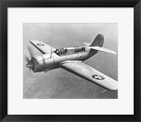 Framed High angle view of a fighter plane in flight, Curtiss SB2C Helldiver, December 1941 Print