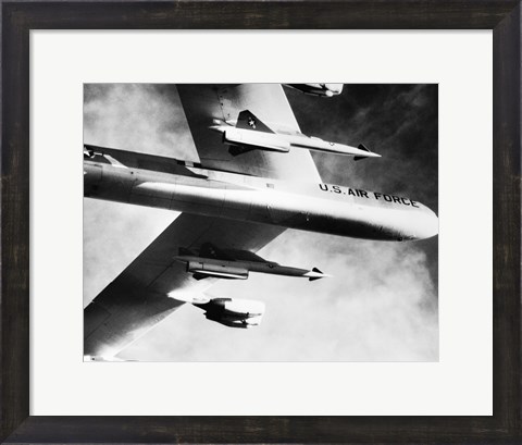 Framed Low angle view of a bomber plane carrying missiles during fight, AGM-28 Hound Dog, B-52 Stratofortress Print
