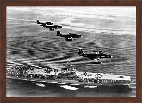 Framed High angle view of four fighter planes flying over an aircraft carrier, US Navy Banshees, USS Coral Sea (CV-43) Print