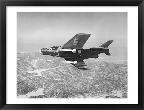 Framed Side profile of a fighter plane carrying sidewinder missiles during flight, F9F-8 Cougar, US Navy Print