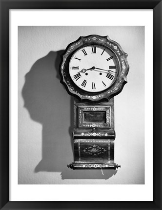 Framed Close-up of clock hanging on wall Print