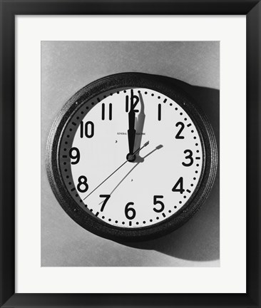 Framed Close-up of a wall clock hanging on a wall Print