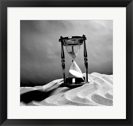 Framed Close up of hourglass on sand Print