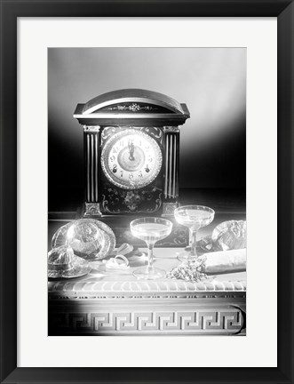 Framed Clock showing 12 o&#39;clock with champagne flutes and party hats in the foreground Print