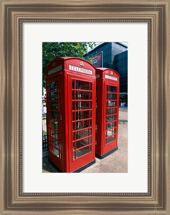 Framed Two telephone booths, London, England Print