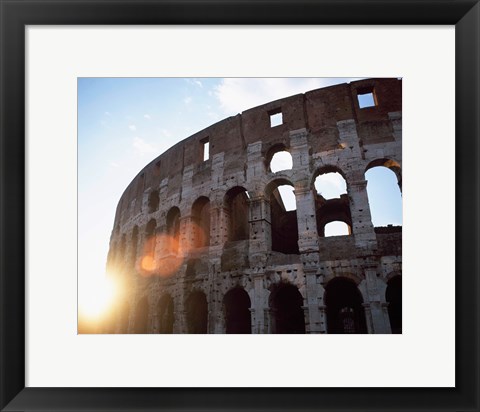 Framed Low angle view of the old ruins of an amphitheater, Colosseum, Rome, Italy Print