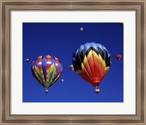 Framed Two Hot Air Balloons Flying Away Together Print