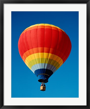 Framed Low angle view of a hot air balloon in the sky, New Mexico, Rainbow Print