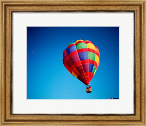 Framed Rainbow Hot Air Balloon with other Hot Air Balloons Far Away Print