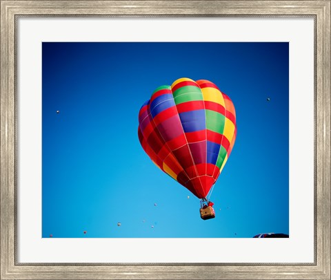 Framed Rainbow Hot Air Balloon with other Hot Air Balloons Far Away Print