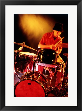 Framed Male drummer playing drums Print