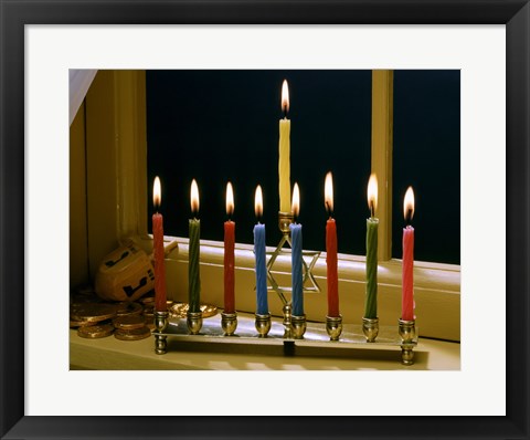 Framed Close-up of a menorah with burning candles and a Star of David Print