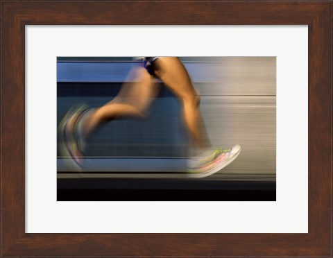 Framed Low section view of a person running on blue Print