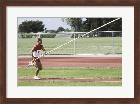 Framed Male athlete pole vaulting Print