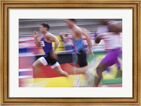 Framed Side profile of three men running on a running track Print