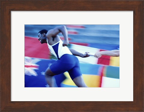 Framed Side profile of runners passing a baton in a relay race Print