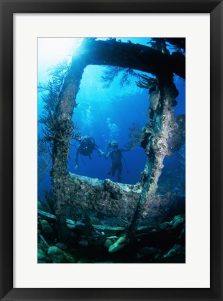 Framed Scuba diver investigating shipwrecks Print