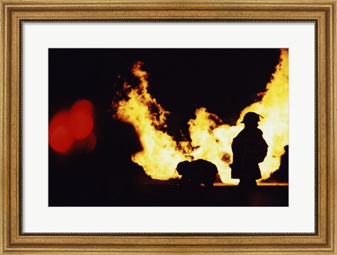 Framed Firefighters In front Of Flames Extinguishing A Fire Print