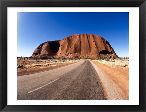 Framed Road passing through a landscape, Ayers Rock, Uluru-Kata Tjuta National Park, Australia Print