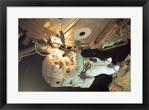 Framed Astronaut Sellers Working on ISS Print