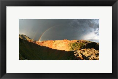 Framed Crater of an extinct volcano with a rainbow in the sky Print