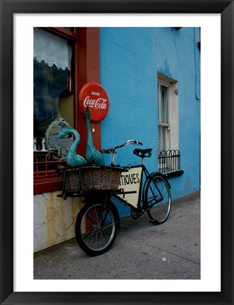 Framed Statues of swans in a basket on a bicycle, Lahinch, Ireland Print