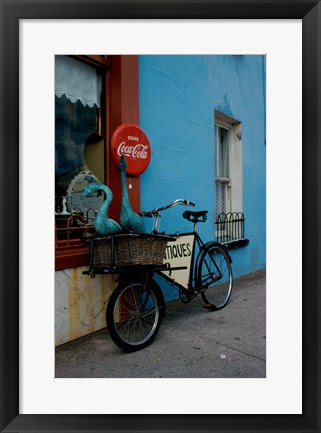 Framed Statues of swans in a basket on a bicycle, Lahinch, Ireland Print