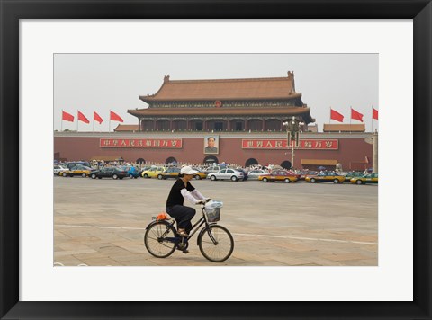 Framed Tourist riding a bicycle at a town square, Tiananmen Gate Of Heavenly Peace, Tiananmen Square, Beijing, China Print