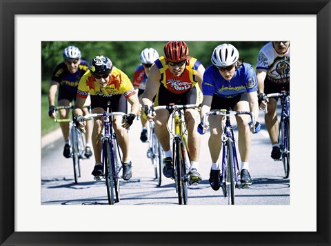 Framed Group of cyclists riding bicycles Print