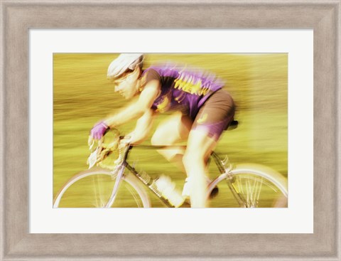 Framed Side profile of a young man cycling Print