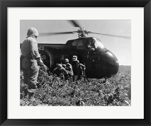 Framed Korea, US Marine Corps, soldiers exiting military helicopter Print