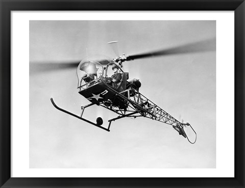 Framed Low angle view of military helicopter in flight Print