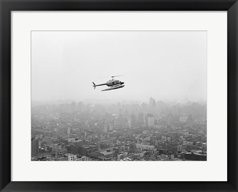 Framed USA, New York State, New York City, Helicopter over city Print