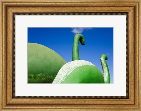 Framed Sculptures of two dinosaurs outside a rock shop, Holbrook, Route 66, Arizona, USA Print