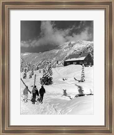 Framed USA, Washington state, three people carrying their skis Print