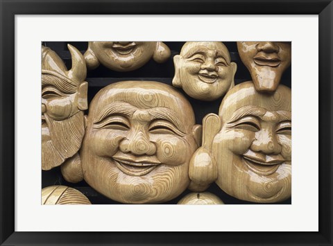 Framed Close-up of Faces of Laughing Buddha, Vietnam Print