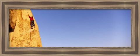 Framed Rear view of a woman climbing a mountain, Joshua Tree National Park, California, USA Print