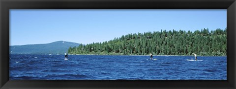 Framed Tourists paddle boarding in a lake, Lake Tahoe, California, USA Print