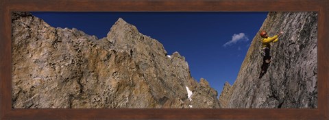 Framed Man climbing up a mountain, Grand Teton, Grand Teton National Park, Wyoming, USA Print