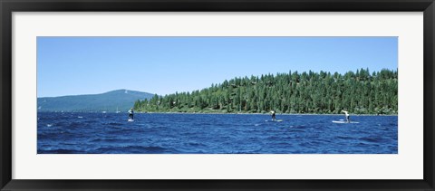 Framed Tourists paddle boarding in a lake, Lake Tahoe, California, USA Print