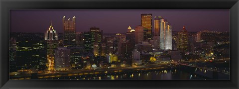 Framed High angle view of buildings lit up at night, Pittsburgh, Pennsylvania, USA Print